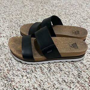 Reef black leather platform sandals